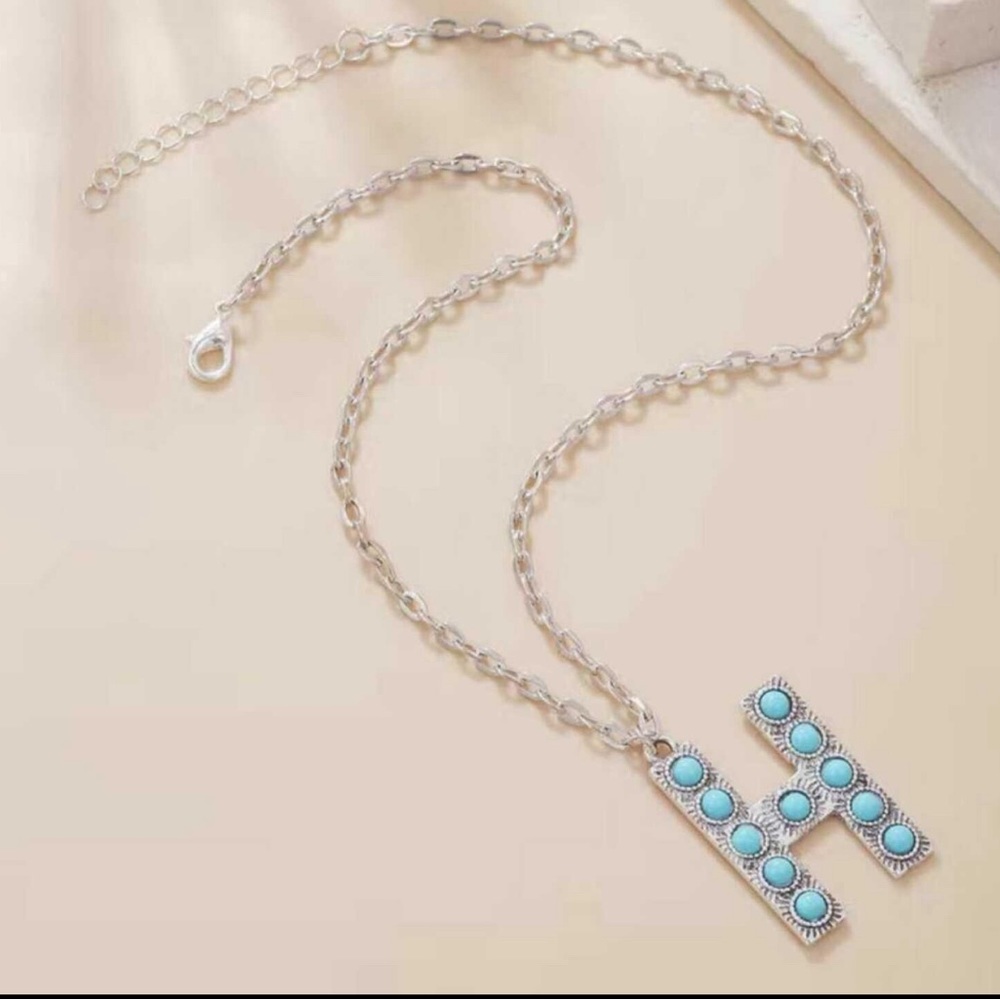 NWT turquoise stone and English initial letter pendant